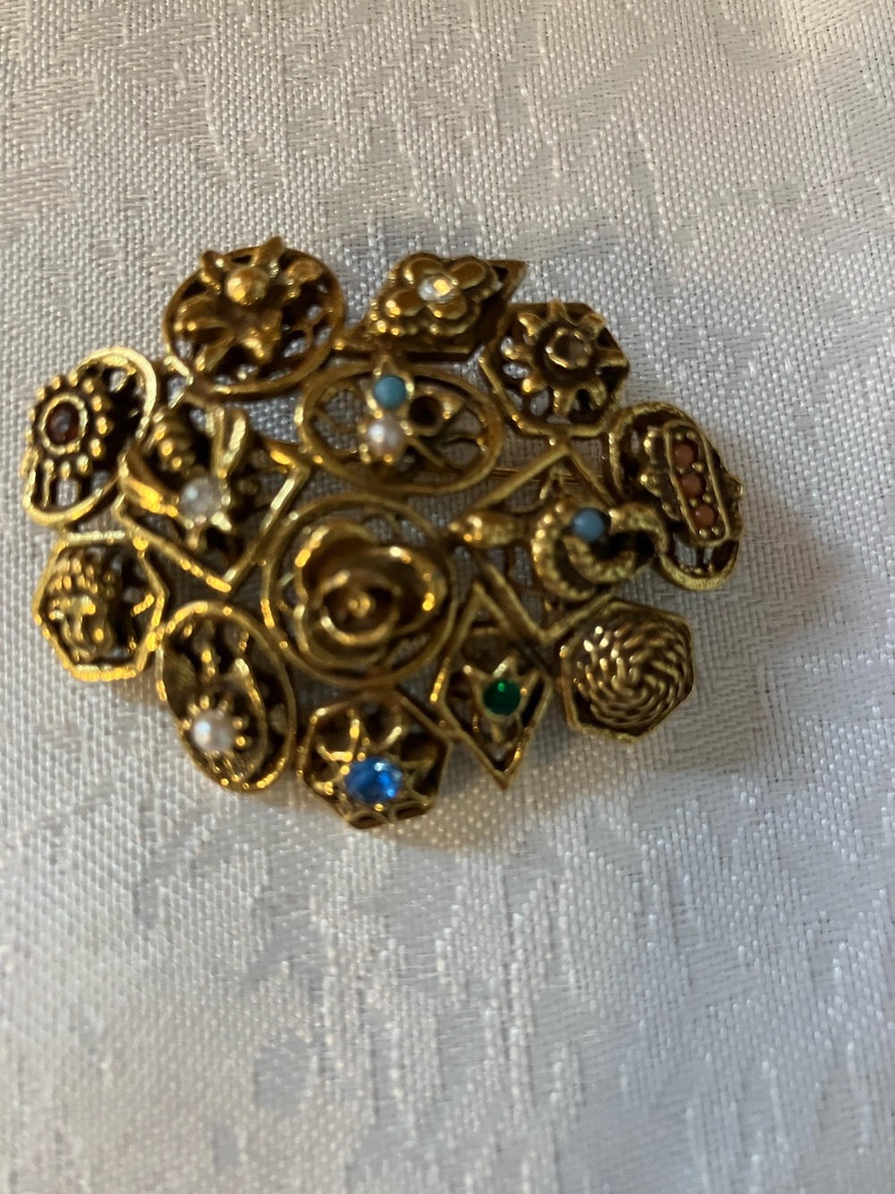 Gold Floral Filigree Brooch with Multicolored Accent Stones